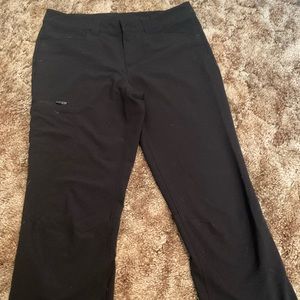 The color is black pants, medium, and the brand is Eddie Bauer